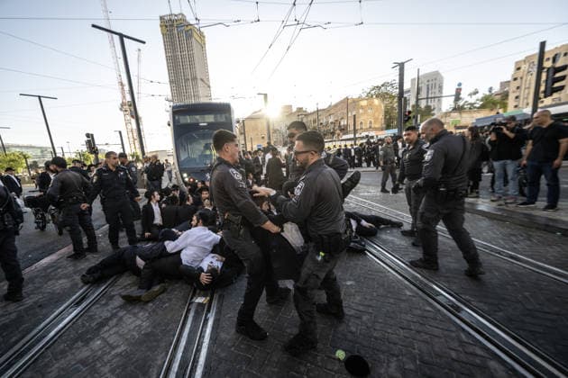 Ultra-Orthodox Jews protest mandatory military service in Jerusalem JERUSALEM - MAY 7: Israeli police use water cannons to disperse Ultra-Orthodox Jewish (Haredi) protesters blocking roads by lying on the ground during a demonstration against the arrest of several yeshiva students over mandatory military service in West Jerusalem on May 7, 2026. Mostafa Alkharouf Anadolu Jerusalem Israel. Editorial use only. Please get in touch for any other usage.  Copyright: x2026xAnadoluxMostafaxAlkharoufx