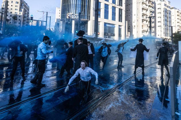 Ultra-Orthodox Jews protest mandatory military service in Jerusalem JERUSALEM - MAY 7: Israeli police use water cannons to disperse Ultra-Orthodox Jewish (Haredi) protesters blocking roads by lying on the ground during a demonstration against the arrest of several yeshiva students over mandatory military service in West Jerusalem on May 7, 2026. Mostafa Alkharouf Anadolu Jerusalem Israel. Editorial use only. Please get in touch for any other usage.  Copyright: x2026xAnadoluxMostafaxAlkharoufx