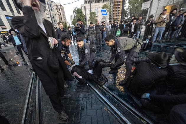 Ultra-Orthodox Jews protest mandatory military service in Jerusalem JERUSALEM - MAY 7: Israeli police use water cannons to disperse Ultra-Orthodox Jewish (Haredi) protesters blocking roads by lying on the ground during a demonstration against the arrest of several yeshiva students over mandatory military service in West Jerusalem on May 7, 2026. Mostafa Alkharouf Anadolu Jerusalem Israel. Editorial use only. Please get in touch for any other usage.  Copyright: x2026xAnadoluxMostafaxAlkharoufx