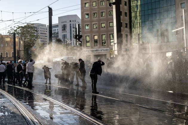 Ultra-Orthodox Jews protest mandatory military service in Jerusalem JERUSALEM - MAY 7: Israeli police use water cannons to disperse Ultra-Orthodox Jewish (Haredi) protesters blocking roads by lying on the ground during a demonstration against the arrest of several yeshiva students over mandatory military service in West Jerusalem on May 7, 2026. Mostafa Alkharouf Anadolu Jerusalem Israel. Editorial use only. Please get in touch for any other usage.  Copyright: x2026xAnadoluxMostafaxAlkharoufx