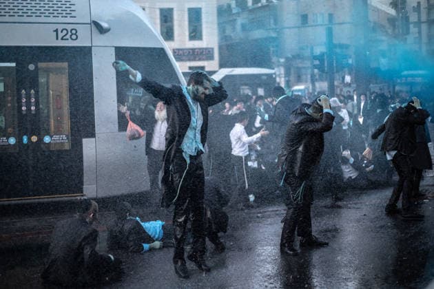 Ultra-Orthodox Jews protest mandatory military service in Jerusalem JERUSALEM - MAY 7: Israeli police use water cannons to disperse Ultra-Orthodox Jewish (Haredi) protesters blocking roads by lying on the ground during a demonstration against the arrest of several yeshiva students over mandatory military service in West Jerusalem on May 7, 2026. Mostafa Alkharouf Anadolu Jerusalem Israel. Editorial use only. Please get in touch for any other usage.  Copyright: x2026xAnadoluxMostafaxAlkharoufx