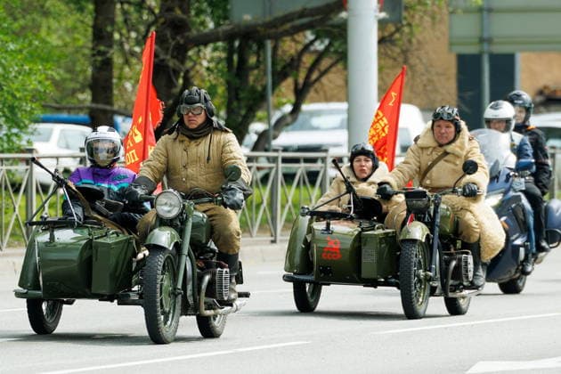 RUSSIA, KALININGRAD - MAY 8, 2026: People take part in the Wheel of History motorcycle rally marking the 81st anniversary of the victory over Nazi Germany in World War II. Alexander Melekhov TASS  92185684