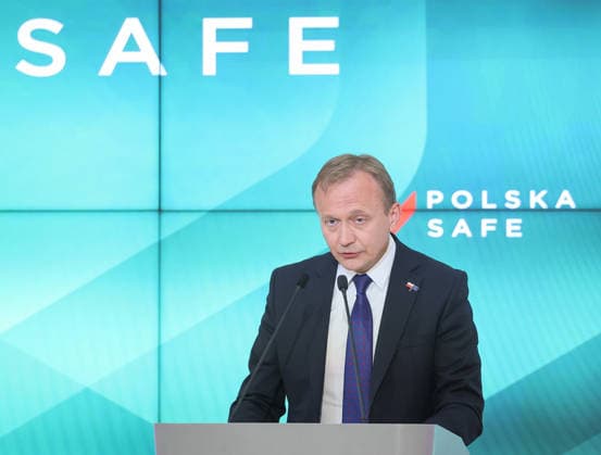 Poland signs SAFE deal Photo: Adam Burakowski East News EU commissioner for budget, anti-fraud and public administration Piotr Serafin speaks as he attends a ceremony of signing an agreement regarding the loan from EU s SAFE (Security Action for Europe) financial instrument on May 8, 2026 in Warsaw, Poland. The deal will allow for a line of credit to purchase defence equipment, including anti-drone systems, worth almost 44 billion euro. EN_01677227_0123 