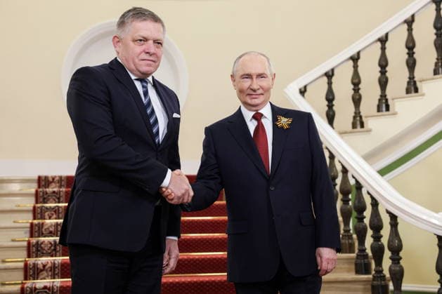 RUSSIA, MOSCOW - MAY 9, 2026: Vladimir Putin (R), President of Russia, greets Robert Fico, Prime Minister of Slovakia, at the Moscow Kremlin ahead of a military parade in Red Square on Victory Day to mark 81 years since the victory of the Soviet Union over Nazi Germany in the Great Patriotic War, Eastern Front of World War II. Gavriil Grigorov Russian Presidential Press and Information Office TASS  92219765