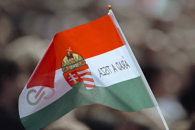 Lawmakers attend the inaugural session of the Hungarian Parliament BUDAPEST, HUNGARY - MAY 9: A Hungarian flag celebrating the TISZA party flies in crowd around the Parliament as people follow Peter Magyar s first official speech on the screens after he was sworn into the parliament as the new Prime Minister of Hungary under the TISZA party, during today s inaugural session of the Hungarian Parliament, in Budapest, Hungary on 9 May 2026. Magyar Peter’s center-right Tisza party secured a decisive victory in the April 12 elections, winning 141 of the 199 parliamentary seats. Robert Nemeti Anadolu Budapest Hungary. Editorial use only. Please get in touch for any other usage.  Copyright: x2026xAnadoluxRobertxNemetix