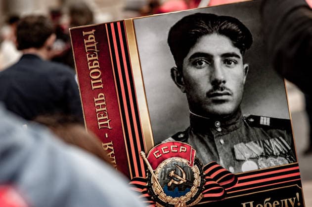 May 9, 2026, Barcelona, Spain: A participant holds a portrait of a Soviet veteran during an Immortal Regiment gathering in Barcelona marking Victory Day, the annual commemoration of the Soviet Union s victory over Nazi Germany in World War II. Barcelona Spain - ZUMAb137 20260509_fap_b137_024 Copyright: xJordixBoixareux