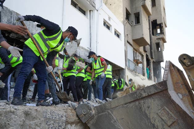 Volunteers clear rubble at al-Shifa Hospital in Gaza City Palestinian volunteers take part in removing rubble and cleaning the outer courtyard of al-Shifa Hospital in Gaza City on May 10, 2026, as part of the Volunteer Work Week activities organized by the Operation Chivalrous Knight 3 initiative. The campaign included cleaning works, rubble removal, tree planting and the installation of shade structures for residents around the hospital. Photo by Ramzi Abu Amer apaimages Khan Yunis Gaza Strip Palestinian Territory 100526_Gaza_RA_00(16).jpeg Copyright: xapaimagesxRamzixxAbuxAmerx xapaimagesx