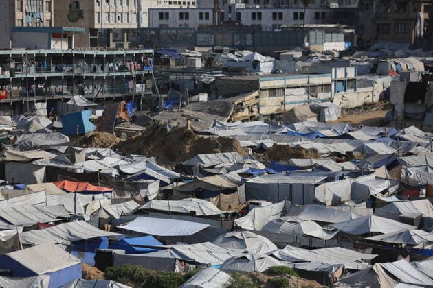 Displaced Palestinians shelter in overcrowded camps west of Gaza City General views show tents sheltering displaced Palestinians crowded together west of Gaza City on May 10, 2026, where thousands of residents live under difficult humanitarian conditions amid shortages of basic services. Many Palestinians continue to flee to densely populated areas across the Gaza Strip as the war continues, while humanitarian organizations warn of worsening living conditions and shortages of food, water and medical care in shelters and displacement camps. Photo by Omar Ashtawy apaimages Gaza city Gaza Strip Palestinian Territory 100526_Gaza_OSH_01(11) Copyright: xapaimagesxOmarxAshtawyx xapaimagesx