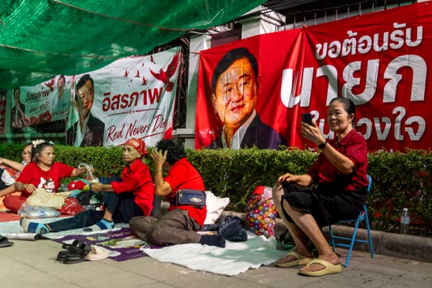 May 10, 2026, Bangkok, Bangkok, Thailand: Supporters of jailed former Prime Minister Thaksin Shinawatra camp outside Klong Prem Central Prison in Bangkok, Thailand, on May 10, 2026, the night before his expected parole release after serving two-thirds of a one-year sentence. Thaksin was convicted on corruption charges in 2023 and sentenced to eight years in prison, later reduced to one year by royal pardon. His case drew renewed controversy after his initial sentence was served almost entirely in a luxury ward at ThailandÃ¢â‚¬â ¢s Police General Hospital, leading to his subsequent return to prison. Bangkok Thailand  - ZUMAt128 20260510_zap_t128_008 Copyright: xAdryelxTalamantesx