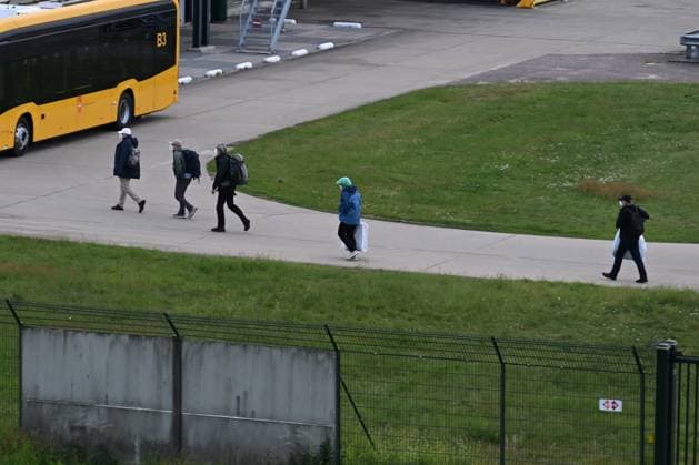 Plane carrying MV Hondius passengers arrives at Eindhoven Airport EINDHOVEN, NETHERLANDS - MAY 10: Passengers walk inside the airport after the plane repatriating 26 Dutch national passengers of the MV Hondius cruise ship, where an outbreak of hantavirus has been detected, lands at Eindhoven Air Base International airport in Eindhoven, Netherlands on May 10, 2026. The World Health Organisation (WHO) has identified six confirmed cases of hantavirus out of eight suspected cases, including three people who have died from this known but rare virus, for which there is neither a vaccine nor a treatment. Mouneb Taim Anadolu Eindhoven Netherlands. Editorial use only. Please get in touch for any other usage.  Copyright: x2026xAnadoluxMounebxTaimx
