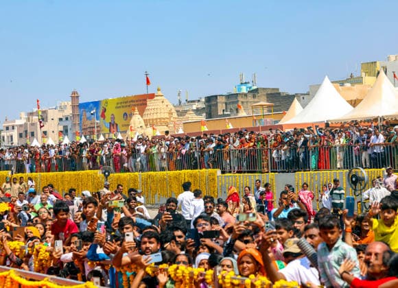 People wave and click pictures during a roadshow by Prime Minister Narendra Modi Gir Somnath, May 11 (ANI): People wave and click pictures during a roadshow by Prime Minister Narendra Modi (unseen) on the occasion of Somnath Amrut Mahotsav, celebrating 75 years of the inauguration of the restored Somnath temple, in Gir Somnath on Monday. (DPR PMO ANI Photo) Gir Somnath Gujarat India Copyright: xANIx ANI_20260511115