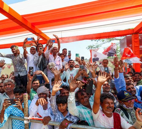 People wave and click pictures during a roadshow by Prime Minister Narendra Modi Gir Somnath, May 11 (ANI): People wave and click pictures during a roadshow by Prime Minister Narendra Modi (unseen) on the occasion of Somnath Amrut Mahotsav, celebrating 75 years of the inauguration of the restored Somnath temple, in Gir Somnath on Monday. (DPR PMO ANI Photo) Gir Somnath Gujarat India Copyright: xANIx ANI_20260511147