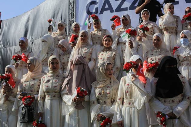 Mass wedding held for Palestinian couples in Gaza City Palestinians take part in a mass wedding ceremony for Palestinian brides and grooms organized by the Turkish Humanitarian Relief Foundation (IHH) in Gaza City on May 11, 2026. The mass wedding was held as part of a humanitarian initiative aimed at supporting 50 grooms who are sons of Palestinians killed during the war, amid difficult humanitarian and economic conditions in the Gaza Strip. Photo by Bilal Osama apaimages Gaza city Gaza Strip Palestinian Territory 110526_Gaza_BO_02(33) Copyright: xapaimagesxBilalxOsamax xapaimagesx