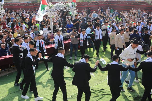 Mass wedding held for Palestinian couples in Gaza City Palestinians take part in a mass wedding ceremony for Palestinian brides and grooms organized by the Turkish Humanitarian Relief Foundation (IHH) in Gaza City on May 11, 2026. The mass wedding was held as part of a humanitarian initiative aimed at supporting 50 grooms who are sons of Palestinians killed during the war, amid difficult humanitarian and economic conditions in the Gaza Strip. Photo by Bilal Osama apaimages Gaza city Gaza Strip Palestinian Territory 110526_Gaza_BO_02(35) Copyright: xapaimagesxBilalxOsamax xapaimagesx