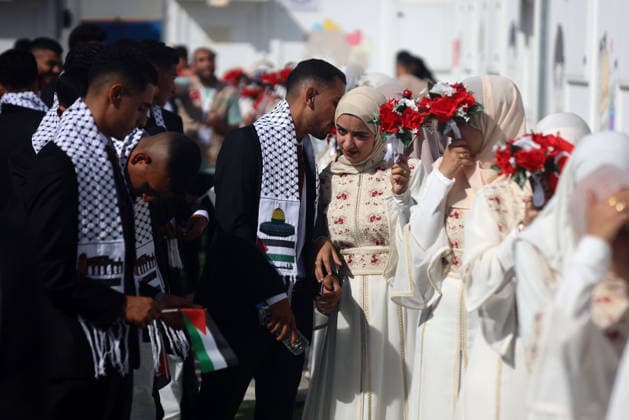 Palestinian-Israeli Conflict - Gaza Mass Wedding Palestinian brides and grooms gather during a mass-wedding celebration organized by the Turkish Humanitarian Relief Foundation (IHH) in Gaza City, on May 11, 2026. Gaza Palestine  Copyright: xMajdixFathix originalFilename: fathi-notitle260511_npaoM.jpg