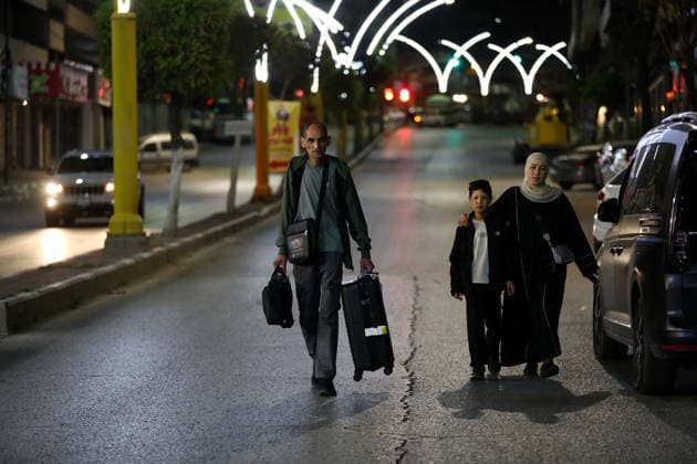 Palestinian pilgrims depart from Hebron for Hajj HEBRON, WEST BANK, PALESTINE - MAY 12: Palestinian pilgrims, who will travel from the West Bank to the holy lands, gather in the city center of Hebron, West Bank, Gaza, before departing by bus on May 12, 2026. Wisam Hashlamoun Anadolu Hebron West Bank. Editorial use only. Please get in touch for any other usage.  Copyright: x2026xAnadoluxWisamxHashlamounx