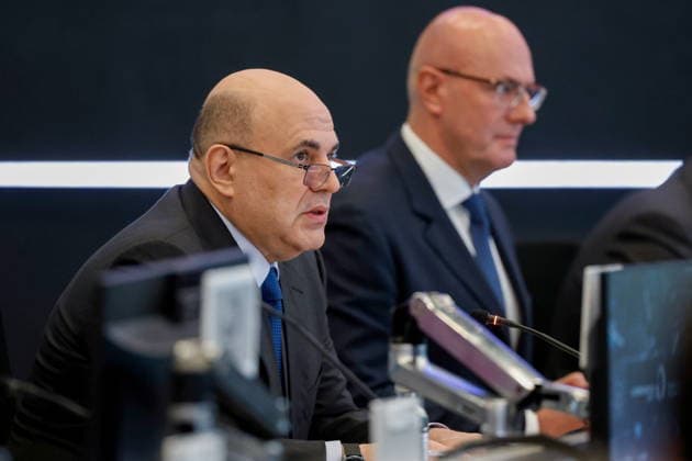 RUSSIA, MOSCOW - MAY 12, 2026: Russia s Prime Minister Mikhail Mishustin (L) and Deputy Prime Minister Dmitry Chernyshenko attend a strategic session on the development of educational institutions that provide training for engineering personnel and scientific research for technological leadership, at the Russian Government Coordination Centre. Dmitry Astakhov POOL TASS  92363145