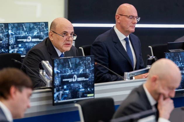 RUSSIA, MOSCOW - MAY 12, 2026: Russia s Prime Minister Mikhail Mishustin (L) and Deputy Prime Minister Dmitry Chernyshenko attend a strategic session on the development of educational institutions that provide training for engineering personnel and scientific research for technological leadership, at the Russian Government Coordination Centre. Dmitry Astakhov POOL TASS  92363154