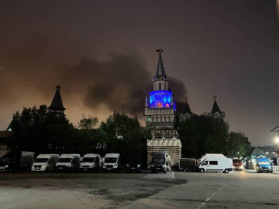 RUSSIA, MOSCOW - MAY 13, 2026: A view of the Izmailovo Kremlin as smoke billows from the burning roof of an adjacent office building. Ksenia Pryanikova TASS  92396160