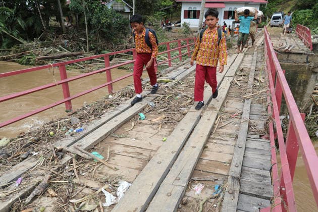 Aftermath of flood in Sumatra TANAH DATAR, INDONESIA - MAY 13: A view of the destruction among the wooden debris affected by floods in Tanah Datar, West Sumatera Province, Indonesia on May 13, 2026. The structures affected by the floods include residential homes, vehicle, irrigation dam, two village bridge, subdistrict roads, and the rice field. Adi Prima Anadolu Tanah Datar Indonesia. Editorial use only. Please get in touch for any other usage.  Copyright: x2026xAnadoluxAdixPrimax