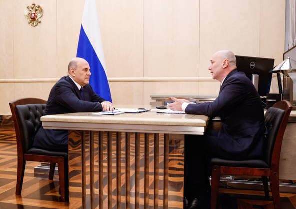 RUSSIA, MOSCOW - MAY 13, 2026: Russia’s Prime Minister Mikhail Mishustin (L) and the head of Russia s Federal Service for Supervision in Education and Science, Anzor Musayev talk during a meeting at the House of the Russian Government. Dmitry Astakhov POOL TASS  92398114