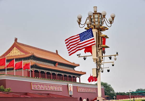 BEIJING, CHINA - MAY 13: National flags of China and the U.S. hang from lamp posts on the Tiananmen Square on May 13, 2026 in Beijing, China. At the invitation of Chinese President Xi Jinping, Trump is visiting China from May 13 to 15.  Copyright: xVCGx 111641168804