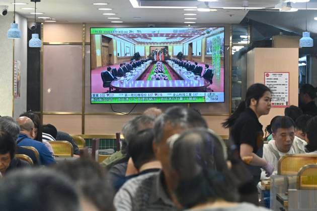 RECORD DATE NOT STATED Trump and Xi Jinping Meeting A TV screen showing a live broadcast of US President Donald Trump and Chinese President Xi Jinping in a meeting in Beijing, China on May 14, 2026 in Hong Kong. (Photo by Stringer Nexpher Images) Hong Kong