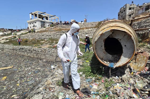 Gaza municipality launches insect control campaign in northern Gaza City Field crews from Gaza Municipality carry out pesticide spraying operations as part of a campaign to combat mosquitoes and harmful insects near Sheikh Radwan pond north of Gaza City on May 14, 2026. The campaign, implemented in cooperation with the Turkish Hudaei Foundation, is scheduled to continue for one week and aims to spray around 300 liters of pesticides in different areas amid deteriorating environmental and health conditions in the Gaza Strip. Photo by Mekael Bhar apaimages Gaza city Gaza Strip Palestinian Territory 140526_Gaza_MB_00(10) Copyright: xapaimagesxMekaelxBharx xapaimagesx