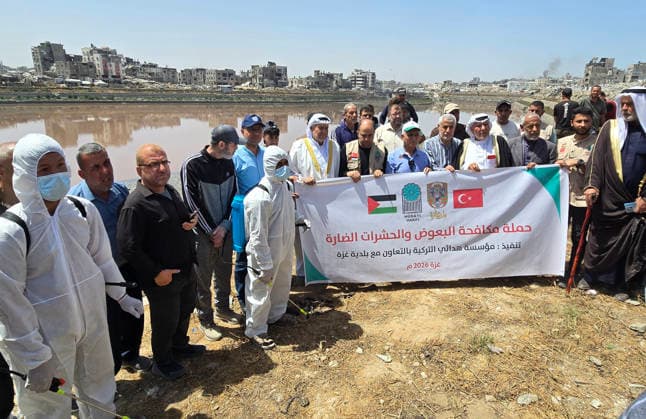 Gaza municipality launches insect control campaign in northern Gaza City Field crews from Gaza Municipality carry out pesticide spraying operations as part of a campaign to combat mosquitoes and harmful insects near Sheikh Radwan pond north of Gaza City on May 14, 2026. The campaign, implemented in cooperation with the Turkish Hudaei Foundation, is scheduled to continue for one week and aims to spray around 300 liters of pesticides in different areas amid deteriorating environmental and health conditions in the Gaza Strip. Photo by Mekael Bhar apaimages Gaza city Gaza Strip Palestinian Territory 140526_Gaza_MB_00(5) Copyright: xapaimagesxMekaelxBharx xapaimagesx