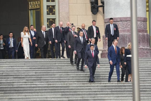 BEIJING, CHINA - MAY 14: Members of the U.S. delegation and CEOs from various industries attend a welcome ceremony for U.S. President Donald Trump outside the Great Hall of the People on May 14, 2026 in Beijing, China. Xi held talks with Trump at the Great Hall of the People in Beijing on Thursday.  Copyright: xVCGx 111641410894