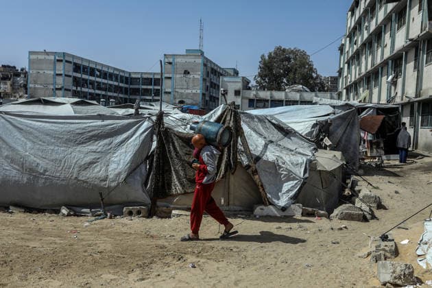 Displaced Palestinians in Khan Yunis struggle under harsh conditions KHAN YUNIS, GAZA, PALESTINE - MAY 14: Displaced Palestinians continue to struggle under difficult conditions in Khan Yunis, Gaza, Palestine on May 14, 2026. Living in tents and temporary shelters with limited resources, Palestinians endure the pain on the anniversary of Nakba ( Great Catastrophe ) amid destruction caused by the Israeli army. Abed Rahim Khatib Anadolu Khan Yunis Gaza. Editorial use only. Please get in touch for any other usage.  Copyright: x2026xAnadoluxAbedxRahimxKhatibx