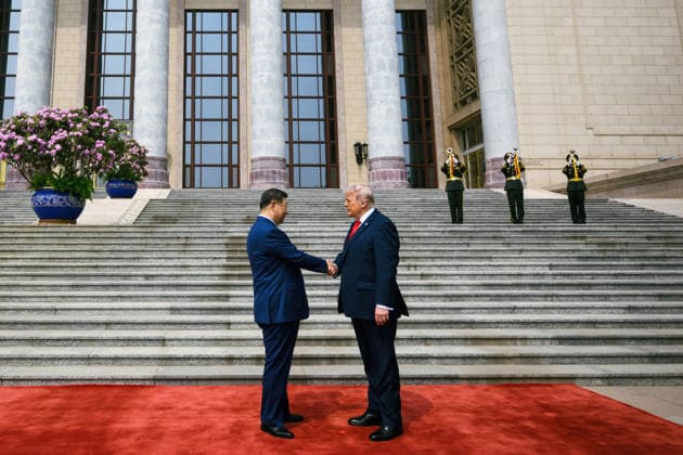 May 14, 2026, Beijing, China: Chinese President Xi Jinping, left, shakes hands with U.S. President Donald Trump, during the official welcoming ceremony at the Great Hall of the People, May 14, 2026 in Beijing, China. Beijing China - ZUMAp138 20260514_zaa_p138_033 Copyright: xHandout WhitexHousex