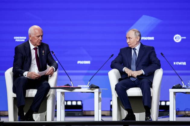 RUSSIA, MOSCOW - MAY 14, 2026: Russia s President Vladimir Putin (R) and Rostec CEO Sergei Chemezov attend the 10th Congress of the Russian Engineering Union at the Russia National Centre. Mikhail Tereshchenko TASS  92459945
