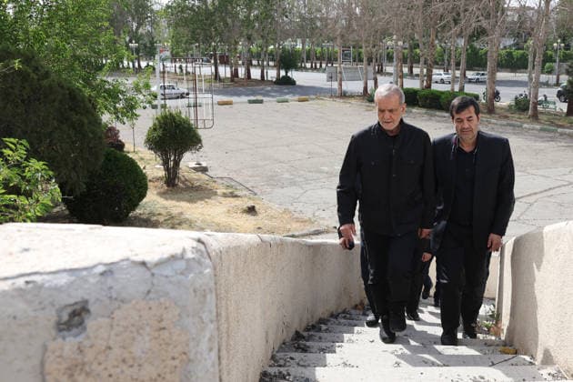 May 13, 2026, Tehran, Iran: Iranian President MASOUD PEZESHKIAN and Minister of Sport and Youth AHMAD DONYAMALI visit a heavily damaged building at Azadi Indoor Stadium following a strike in western Tehran. The United States and Israel started striking Iran on February 28, killing Iran s supreme leader and top military leaders, and prompting authorities to retaliate with strikes on Israel and across the Gulf. Iran s chief negotiator said on May 12 that Washington must accept Tehran s latest peace plan or face failure, after US President Donald Trump warned the truce in the Middle East war was on the brink of collapse. Tehran Iran - ZUMAi98_ 20260513_zih_i98_274 Copyright: xIranianxPresidencyx