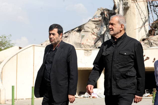 May 13, 2026, Tehran, Iran: Iranian President MASOUD PEZESHKIAN and Minister of Sport and Youth AHMAD DONYAMALI visit a heavily damaged building at Azadi Indoor Stadium following a strike in western Tehran. The United States and Israel started striking Iran on February 28, killing Iran s supreme leader and top military leaders, and prompting authorities to retaliate with strikes on Israel and across the Gulf. Iran s chief negotiator said on May 12 that Washington must accept Tehran s latest peace plan or face failure, after US President Donald Trump warned the truce in the Middle East war was on the brink of collapse. Tehran Iran - ZUMAi98_ 20260513_zih_i98_284 Copyright: xIranianxPresidencyx