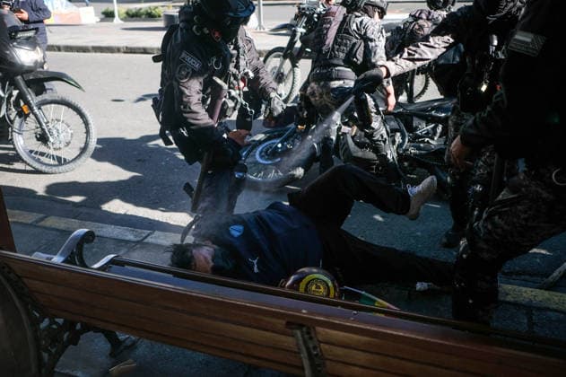 Miners attempt to break through police cordon in La Paz LA PAZ, BOLIVIA - MAY 14: Bolivian police officers spray pepper spray at a detained miner during clashes with security forces as mining cooperatives protested to demand fuel supplies, access to explosives and improved mining conditions La Paz, Bolivia, on May 14, 2026. Carlos Sanchez Navas Anadolu La Paz Bolivia. Editorial use only. Please get in touch for any other usage.  Copyright: x2026xAnadoluxCarlosxSanchezxNavasx