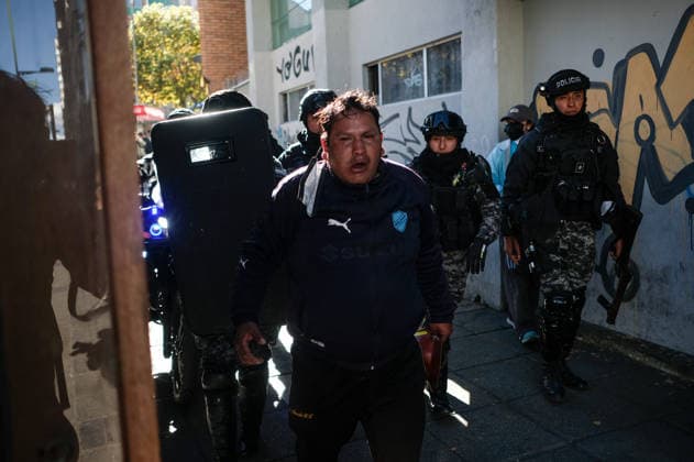 Miners attempt to break through police cordon in La Paz LA PAZ, BOLIVIA - MAY 14: A detained miner is escorted to police cells by Bolivian officers in downtown during clashes with police as mining cooperatives protested to demand fuel supplies, access to explosives and improved mining conditions La Paz, Bolivia, on May 14, 2026. Carlos Sanchez Navas Anadolu La Paz Bolivia. Editorial use only. Please get in touch for any other usage.  Copyright: x2026xAnadoluxCarlosxSanchezxNavasx