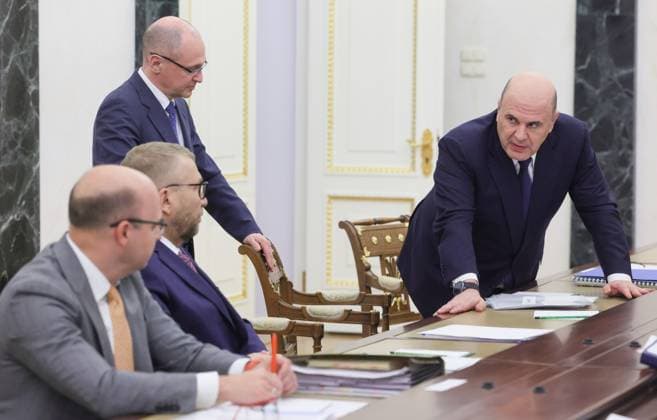 Russia Putin Economy 9166000 15.05.2026 Russian Prime Minister Mikhail Mishustin and First Deputy Chief of Staff of the Presidential Executive Office Sergei Kiriyenko take their seats before a meeting on economic issues held by President Vladimir Putin at the Kremlin in Moscow, Russia. Mikhail Metzel Sputnik Moscow Russia  Copyright: xMikhailxMetzelx