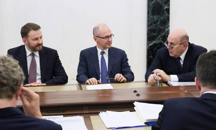 Russia Putin Economy 9166027 15.05.2026 Russian Prime Minister Mikhail Mishustin speaks with First Deputy Chief of Staff of the Presidential Executive Office Sergei Kiriyenko and Deputy Chief of Staff of the Presidential Executive Office Maxim Oreshkin before a meeting on economic issues held by President Vladimir Putin at the Kremlin in Moscow, Russia. Mikhail Metzel Sputnik Moscow Russia  Copyright: xMikhailxMetzelx