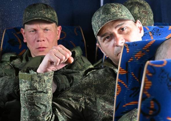 Russia Ukraine Military Operation POWs Exchange 9166409 15.05.2026 Russian prisoners of war, released from Ukrainian captivity amid Russia™s military operation in Ukraine, sit in a bus upon arrival at an airfield in Moscow region, Russia. Russia and â Ukraine swapped 205 prisoners of war each on May 15, part of an agreement linked to a three-day ceasefire earlier this month brokered by ‹U.S. â President Donald Trump. Ilya Pitalev Sputnik Moscow region Russia  Copyright: xIlyaxPitalevx