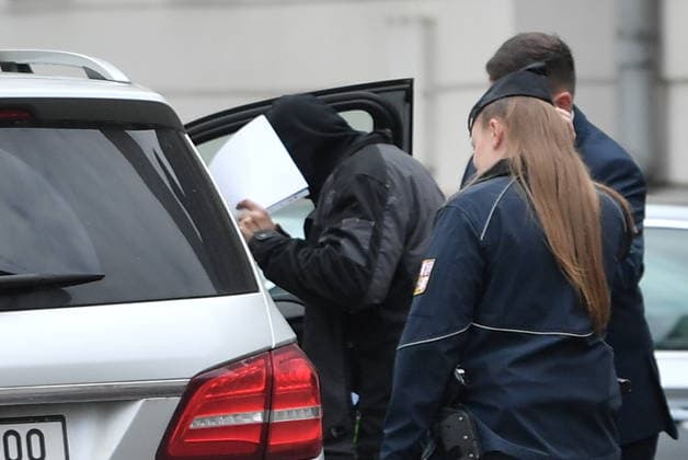 A man (left) suspected of stealing a precious relic, the skull of Saint Zdislava of Lemberk, walks with his lawyer (right) away from the district court that did not send him into custody, in Ceska Lipa, Czech Republic, on May 16, 2026. (CTKxPhoto VitxCerny) CTKPhotoP2026051602539  CTKPhotoP2026051602539