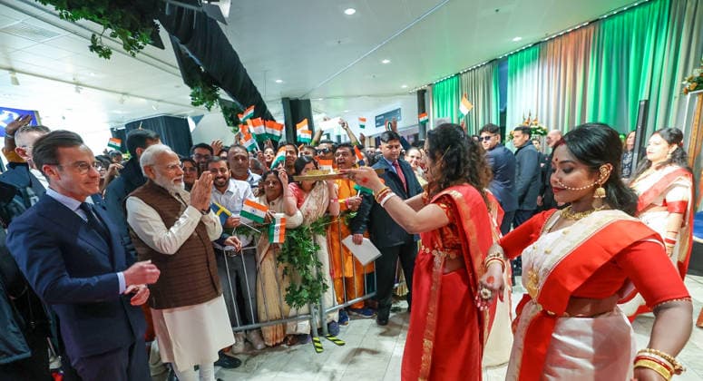 RECORD DATE NOT STATED PM Modi arrives to a warm welcome in Sweden Gothenburg Sweden , May 17 (ANI): Prime Minister Narendra Modi witnesses a cultural performance during his reception by the Indian diaspora, in Gothenburg on Sunday. Sweden Prime Minister Ulf Kristersson also present. (Narendra Modi Photo gallery ANI Photo) Gothenburg Sweden Copyright: xANIx ANI_20260517435