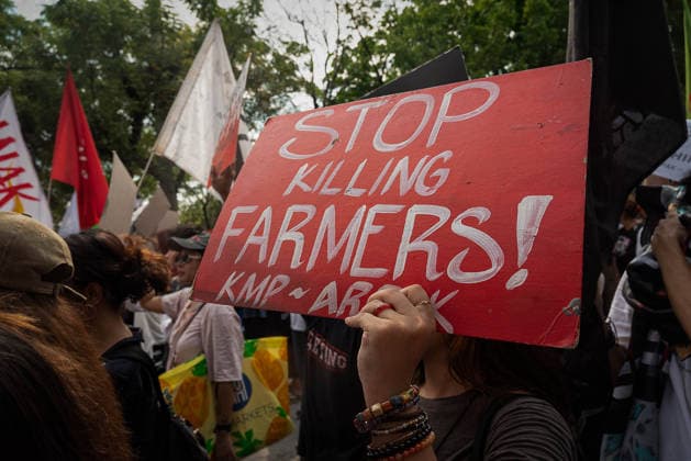 May 18, 2026, Pasay, Metro Manila, Philippines: A protester holds up a sign demanding a stop to the violence to the farm and agricultural workers in the provinces. Pasay Philippines - ZUMAy102 20260518_zip_y102_021 Copyright: xKenosisxYapx