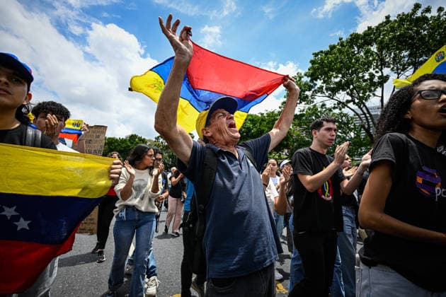 Demonstration in honor of Carmen Navas in Caracas CARACAS, VENEZUELA - MAY 18: Protesters attend a demonstration in honor of Carmen Navas, an 82-year-old mother who died after months of demanding information about her detained son, Victor Quero, who died in state custody in Caracas, Venezuela, May 18, 2026. Maxwell Brienco Anadolu Caracas Venezuela. Editorial use only. Please get in touch for any other usage.  Copyright: x2026xAnadoluxMaxwellxBriencox