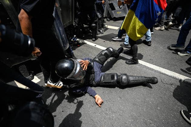 Demonstration in honor of Carmen Navas in Caracas CARACAS, VENEZUELA - MAY 18: Protesters attend a demonstration in honor of Carmen Navas, an 82-year-old mother who died after months of demanding information about her detained son, Victor Quero, who died in state custody in Caracas, Venezuela, May 18, 2026. Maxwell Brienco Anadolu Caracas Venezuela. Editorial use only. Please get in touch for any other usage.  Copyright: x2026xAnadoluxMaxwellxBriencox