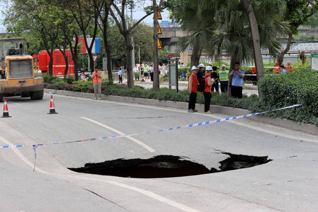 LIUZHOU, CHINA - MAY 18: A hole opens in the road after a 5.2-magnitude earthquake on May 18, 2026 in Liunan District, Liuzhou City, Guangxi Zhuang Autonomous Region of China. A 5.2-magnitude earthquake struck Liuzhou, a city in south China s Guangxi Zhuang Autonomous Region, early Monday, leaving three people missing and four others hospitalized, local authorities said.  Copyright: xVCGx 111642449240
