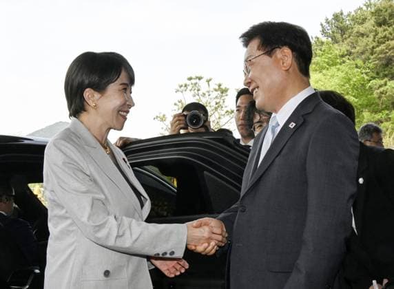 Japan-S. Korea summit Japanese Prime Minister Sanae Takaichi (L) is greeted by South Korean President Lee Jae Myung before their summit meeting in Andong, South Korea, on May 19, 2026.  A14AA0005582116P