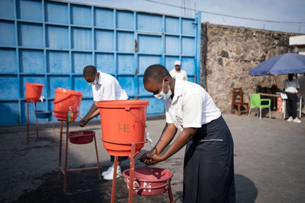 (260519) -- GOMA, May 19, 2026 -- Local residents wash hands under the inuction of medical workers in Goma, the Democratic Republic of the Congo (DRC), on May 19, 2026. Around 131 suspected deaths and 513 suspected cases have been reported in the latest Ebola outbreak in the Democratic Republic of the Congo, DRC Health Minister Roger Kamba said Tuesday. ( Xinhua) DR CONGO-GOMA-EBOLA OUTBREAK Str 