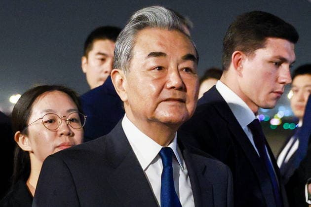 CHINA, BEIJING - MAY 19, 2026: China s Minister of Foreign Affairs Wang Yi (C) during a ceremony marking the arrival of and Russia s President Putin (not pictured) at Beijing Capital International Airport (Shoudu). Russian President Putin s official visit to China coincides with the 25th anniversary of the Treaty of Good-Neighbourliness and Friendly Cooperation Between the People s Republic of China and the Russian Federation, which was signed on 16 July, 2001 Beijing China  - ZUMAt113 20260519_zaa_t113_558 Copyright: xVladimirxSmirnovx