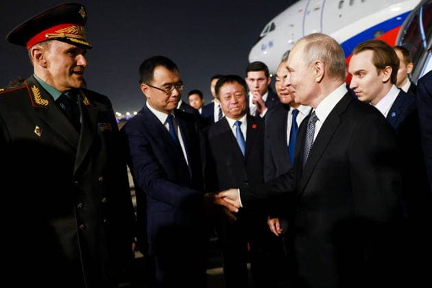 CHINA, BEIJING - MAY 19, 2026: Russia s President Vladimir Putin (2nd R) and China s Minister of Foreign Affairs Wang Yi (3rd R) during a ceremony marking Putin s arrival at Beijing Capital International Airport (Shoudu). Russian President Putin s official visit to China coincides with the 25th anniversary of the Treaty of Good-Neighbourliness and Friendly Cooperation Between the People s Republic of China and the Russian Federation, which was signed on 16 July, 2001 Beijing China  - ZUMAt113 20260519_zaa_t113_540 Copyright: xVladimirxSmirnovx